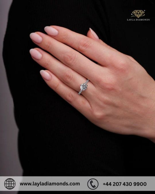 A timeless round ring with diamonds crafted for heartfelt moments