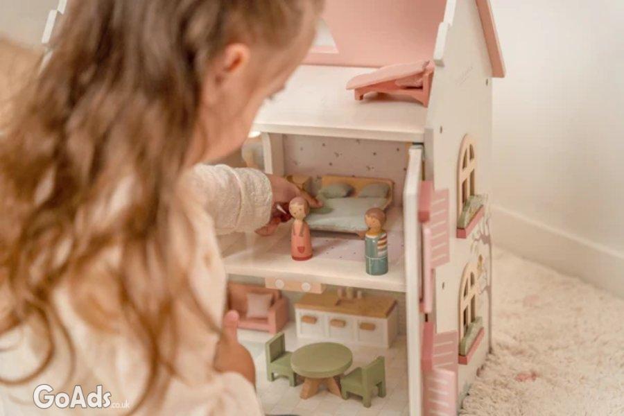 Little Dutch Dolls House with 25 pieces of furniture and accessories.